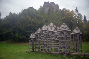 This photo features a wooden architectural piece amidst a stunning natural scene.