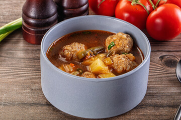 Tomato Soup with meatballs and vegetables