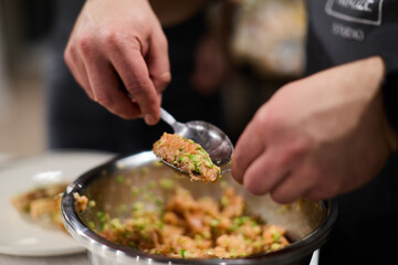 Serving salmon tartare with avocado