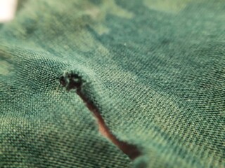 closeup old green bamboo cotton clothes texture