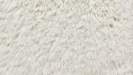 soft white faux fur texture with natural fibers and subtle gray tones ideal for cozy background or...