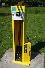 Self service bicycle repair station (samoobsługowa stacja naprawy rowerów), public stand with pump and tools. Tychy, Poland. © aerrant