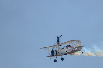 A person standing in an airplane 
