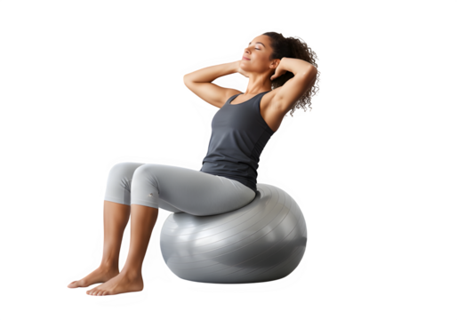 Young woman exercising on stability ball in fitness studio isolate