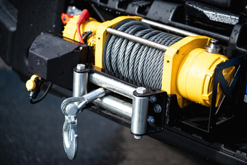 Yellow winch of an off road vehicle