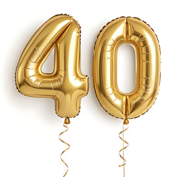 Two gold foil balloons shaped like the number forty with ribbons against a white background studio shot