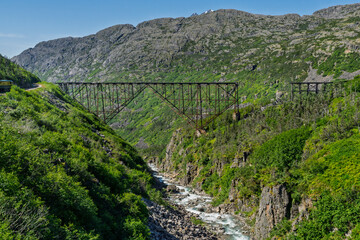 Historic White pass and yukon Railroad suspension bridge deteriorating seen in Skagway Alaska