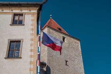 Flag of the Czech Republic flies in front of the gate of Prague Castle
