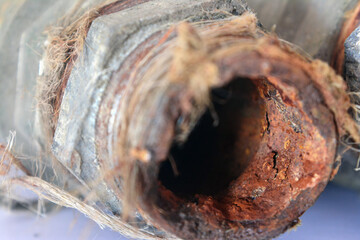 Old, rusty, and rotten pipe