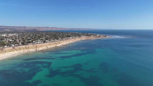 Port Willunga Beach, South Australia &ndash; 4K Aerial Drone Footage of Australia Beach, Historic Jetty Ruins, Limestone Cliffs, Golden Sand, Clear Blue Ocean Coastline, and Coastal Houses