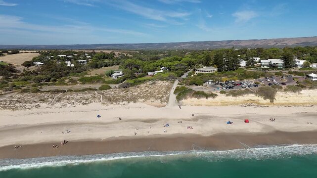 Port Willunga Beach, South Australia &ndash; 4K Aerial Drone Footage of Australia Beach, Historic Jetty Ruins, Limestone Cliffs, Golden Sand, Clear Blue Ocean Coastline, and Coastal Houses