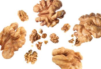 Walnuts swirling in air against white background