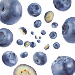 Fresh blueberries swirling in air against white background