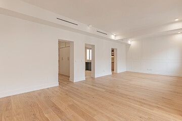 Living room in a luxury residence, with premium finishes, an invisible HVAC system, and windows with opacity control