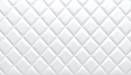 Obraz premium White quilted fabric with diamond pattern.