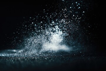 Abstract glitter explosion on dark background