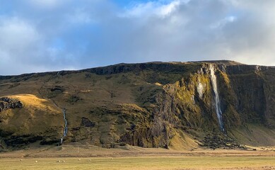 Pair of Waterfalls Scenes from Travel through Remote Iceland