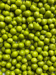 Close-up of fresh green peas, healthy food background, organic vegetable texture, macro photography