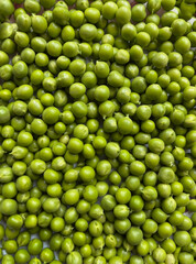 Close-up of fresh green peas, healthy food background, organic vegetable texture, macro photography