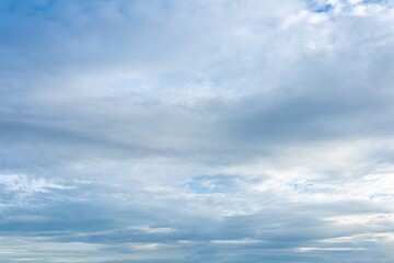 Cloudy sky with light blue and gray clouds A high resolution image of a daytime sky showing various cloud formations