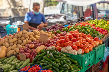 Vegetable stall on market in Chania, Crete, Greece with blurrred background