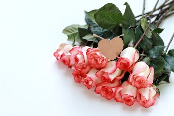 Rose Jumilia, bouquet of roses, pink rose flowers on the table, free space