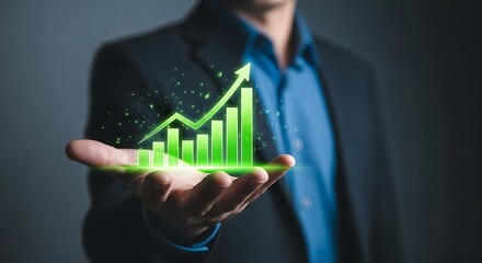A man holds a glowing green bar graph with an upward arrow representing business growth and financial success