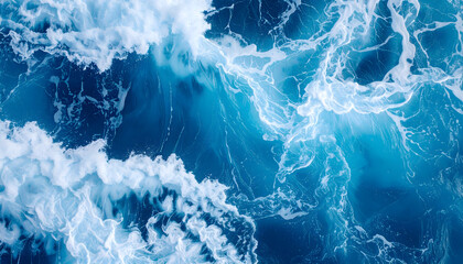 Aerial View Of Blue Ocean Waves Forming White Foamy Textures And Dynamic Water Surface