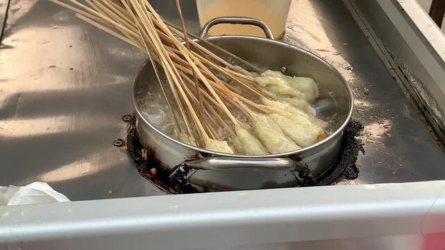 Time lapse the process of frying sempol (Traditional Indonesian food).  Sempol is a type of fried food made from tapioca flour, This food comes from Indonesia. Good and delicious street food.
