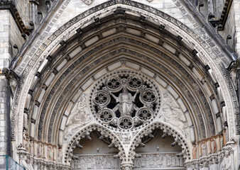 New York City, Cathedral of St. John the Divine, intricate stone carvings above the entrance