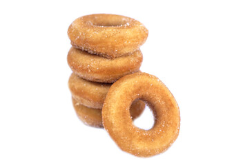 Homemade sugar milk donuts on white background, soft and fluffy texture, buttery aroma, fried snack. Delicious treat for eating or selling, concept of fried pastry and sweet dessert.          