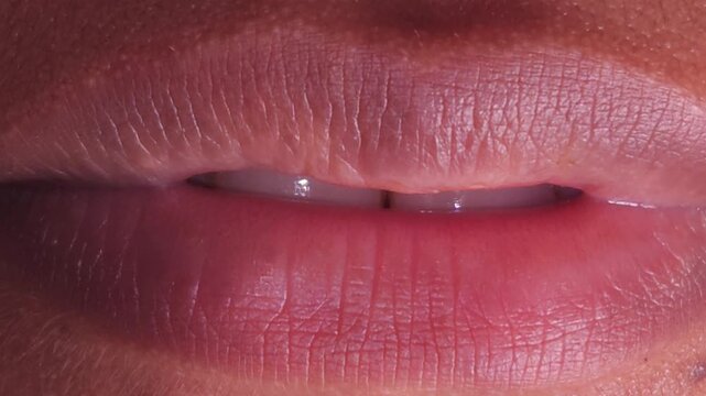 Close up Macro of Indian teenage girl lips doing various types of expressions.