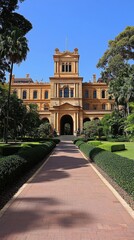 Grand historic mansion with manicured lawn path
