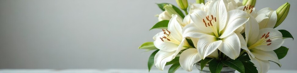 Obraz premium Elegant White Lily and Rose Funeral Arrangement in Classic Urn. Perfect for Sympathy Cards, Memorial Services, and Remembrance Imagery. Solemn and Peaceful Floral Display.