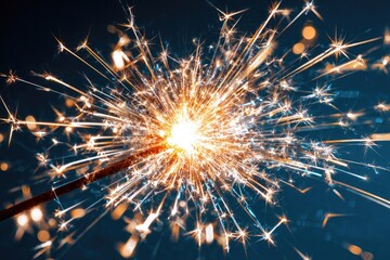 Obraz premium Sparkling sparkler bursts in dark background