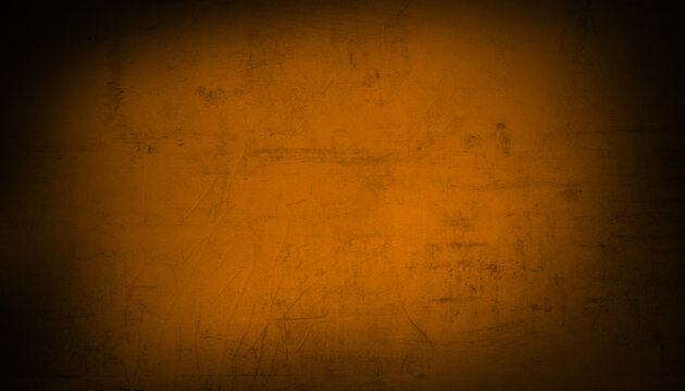 Dark grunge orange texture background with spooky vibe for Halloween design gradient