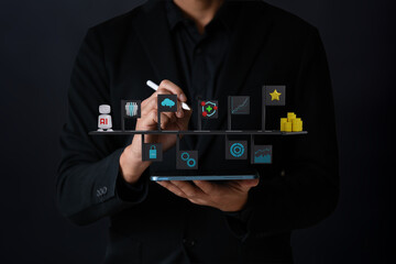 The Business man work with laptop seek timeline and target goal floating on screen