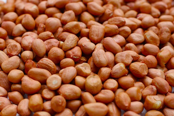 Raw peanuts with red skin