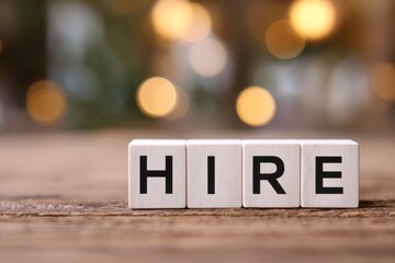 white blocks spell hire