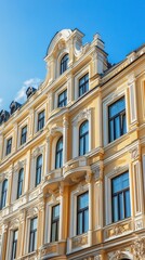 Obraz premium Ornate yellow building facade, classic architecture