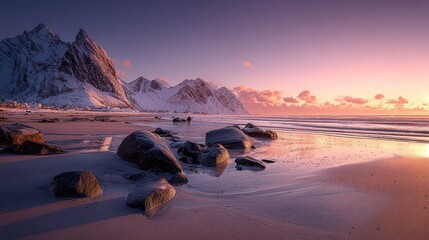 A serene beach with snowy mountains under a colorful sunset sky, featuring smooth stones and calm waves.