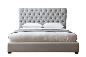 Obraz premium Light grey tufted upholstered bed with white pillows and grey throw isolated on a transparent background