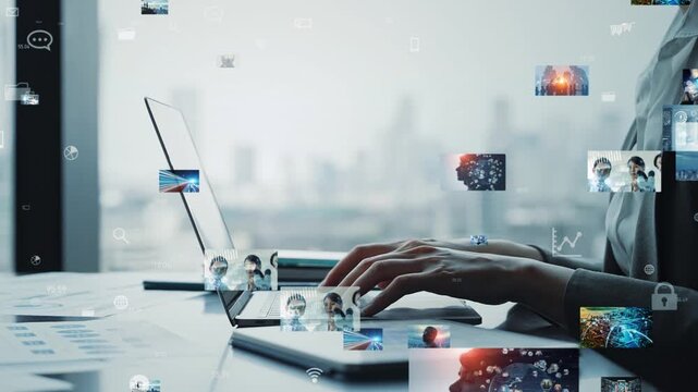 Woman using laptop in office and video data concept