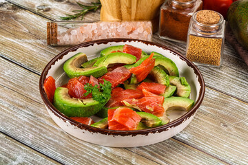 Salad with avocado and salmon