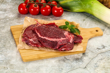 Raw beef cheeks cut for cooking