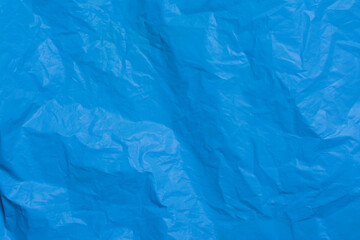 Crumpled texture blue bag, blue plastic bag pattern background.