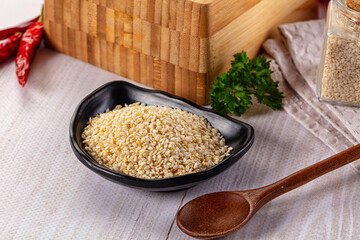 Raw dry sesame seeds heap
