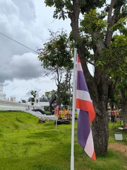 The Thai flag sits calmly in the temple
