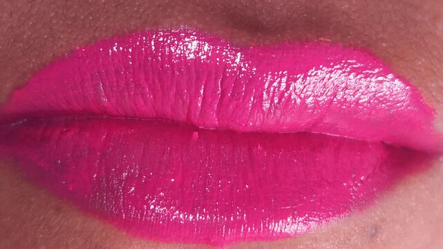 Close up Macro of Indian teenage girl lips doing various types of expressions. lift, Frown, grimace, moue, scowl, pout, Kiss, smooch, smack, peck, graze, caress, skim