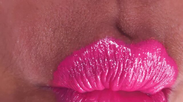 Close up Macro of Indian teenage girl lips doing various types of expressions. lift, Frown, grimace, moue, scowl, pout, Kiss, smooch, smack, peck, graze, caress, skim